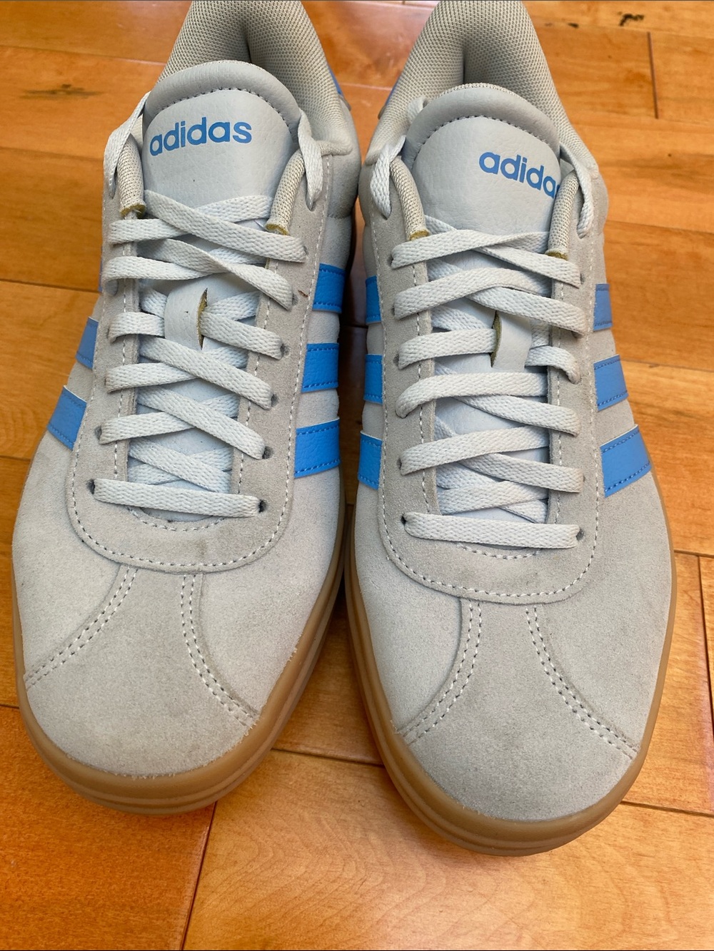 adidas Women’s Light Gray Suede Sneakers with Blue Stripes